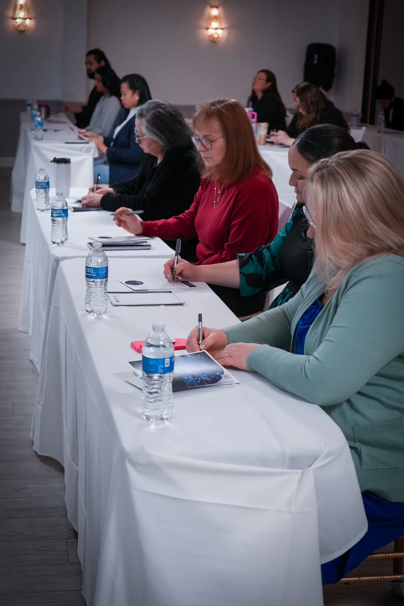 Attendees taking notes